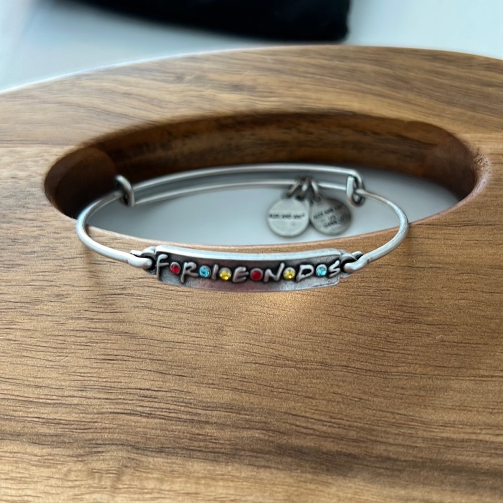 Alex and Ani “Friends” adjustable bangle. Rafaelian silver finish.